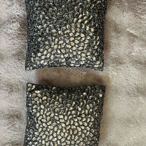 Geolin purchased at henri bendel, silver mirrored accent pillows, silkpoly blend